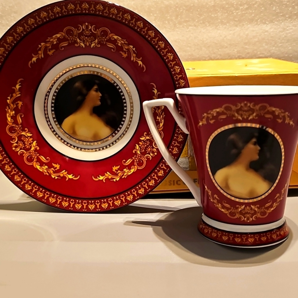 Collectable Cup and Saucer Cobalt and Gold color.